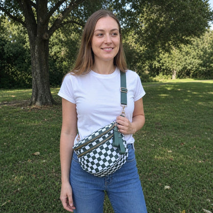 A woman outdoors wearing the Stampira CarryAll crossbody bag