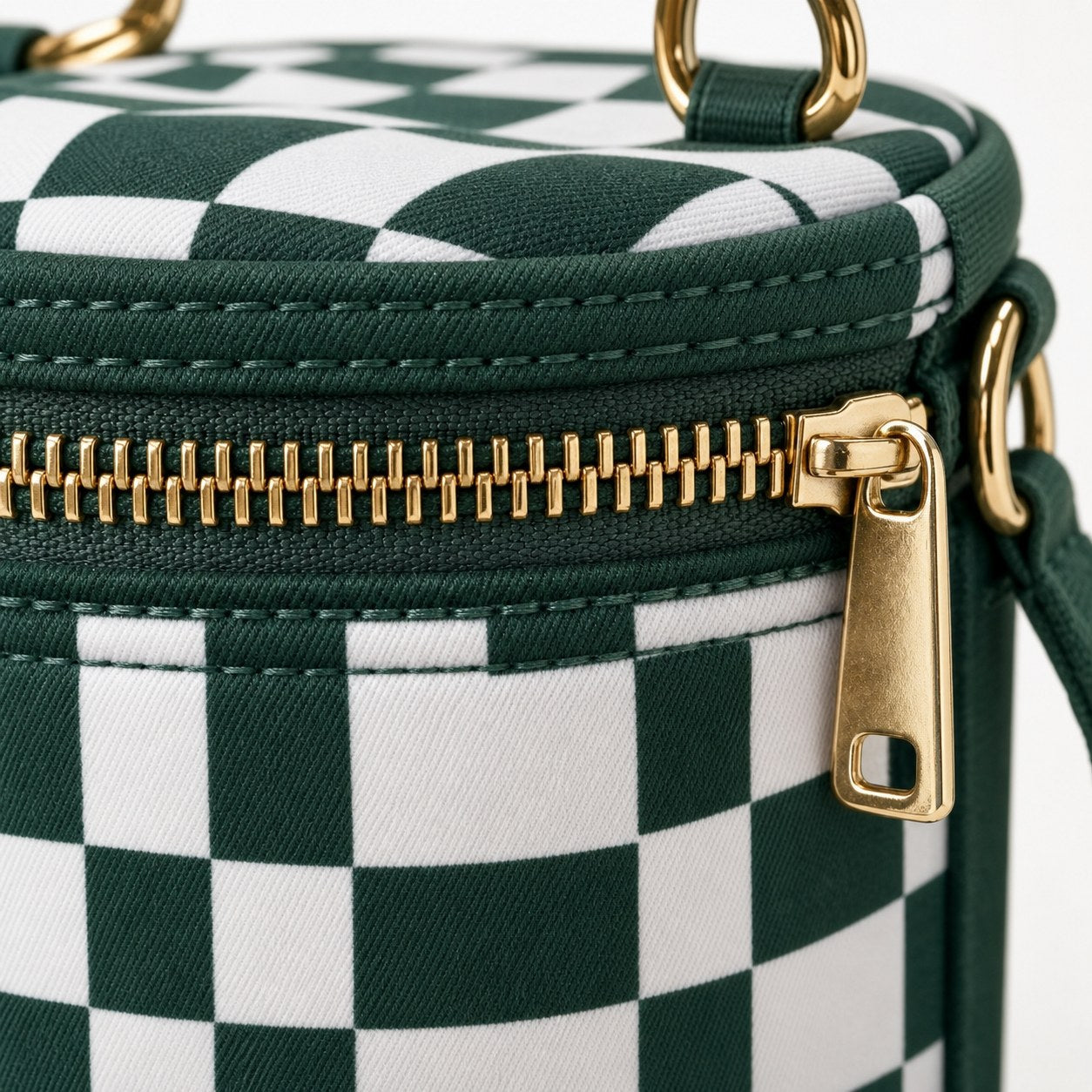 Close-up of the metal zipper and reinforced stitching
