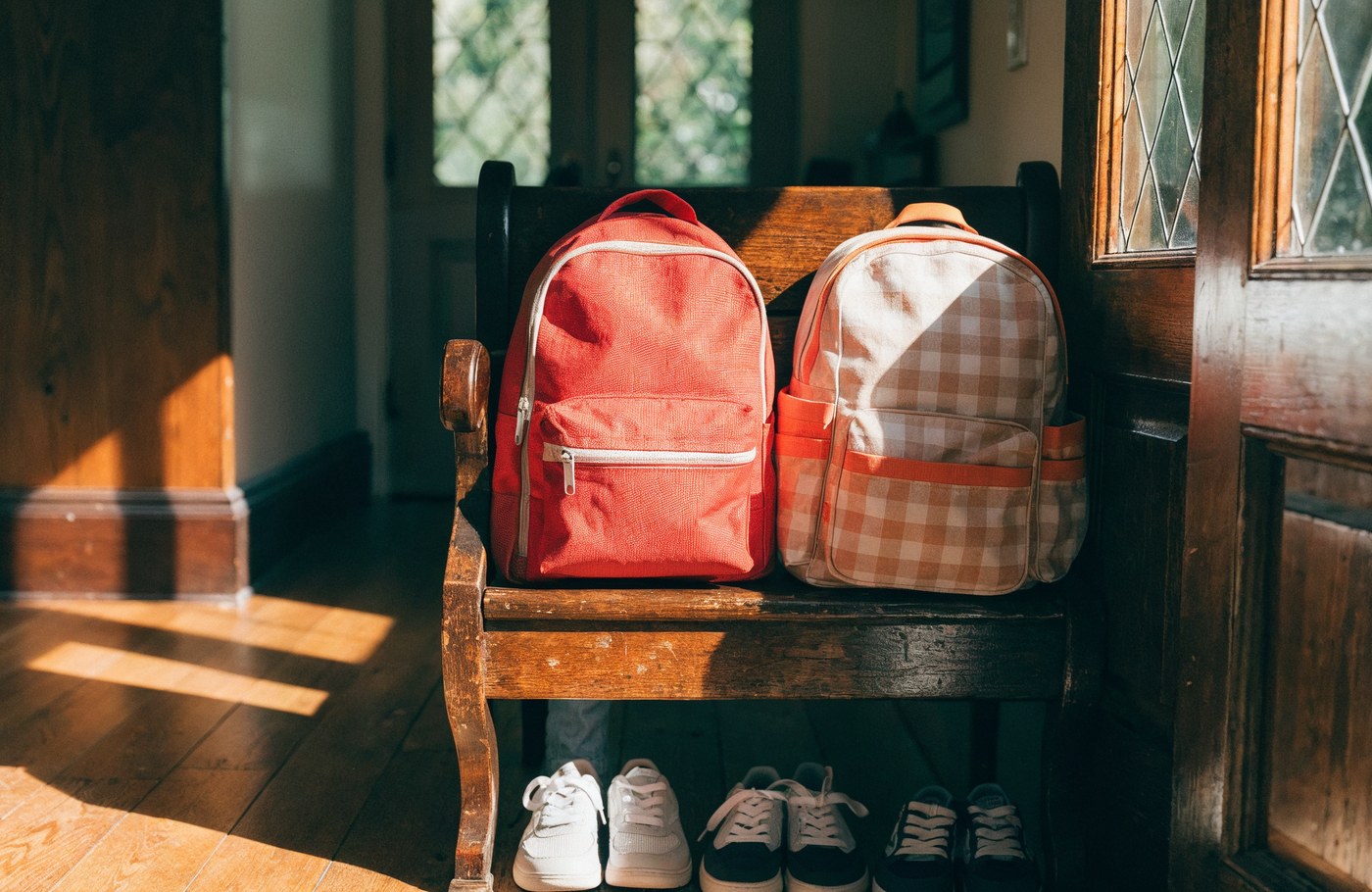 Two children's backpacks side by side